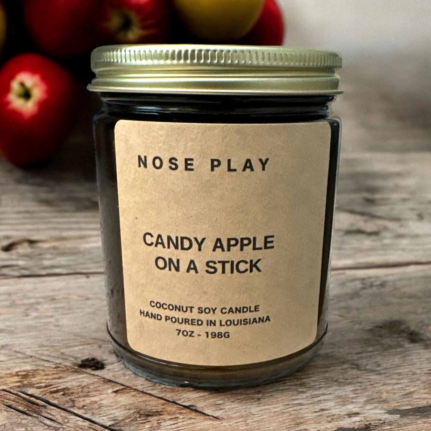 CANDY APPLE ON A STICK CANDLE